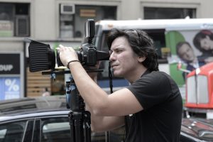 photographer taking video of event